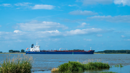 Cargo container ship on river