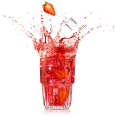 strawberry and ice cube falling into a splashing cocktail isolated on white