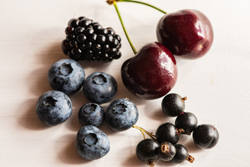 mixture variety of purple dark superfood antioxidant antiaging fruits