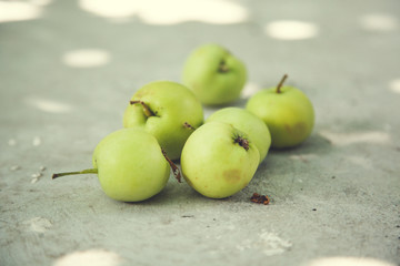green apple on ground