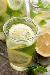 Fototapeta premium Fresh lemonade with mint and ice cubes