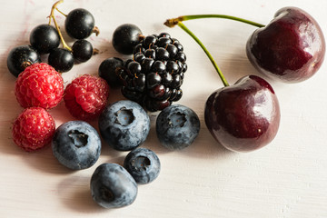 mixture variety of purple dark superfood antioxidant antiaging fruits