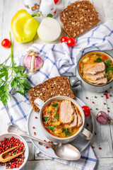 Meat soup with fresh cabbage and vegetables.
