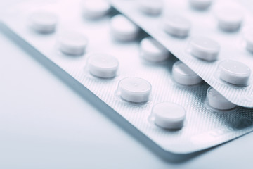 Packs of pills isolated on white background