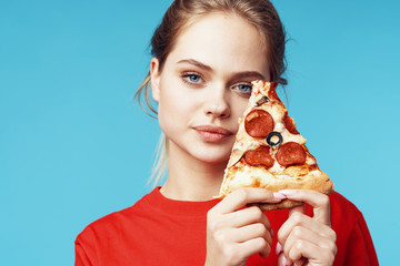 young woman eating cake