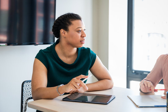 Businesswoman sitting in meeting