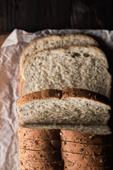 Aerial view of a freshly baked loaf of bread on baking paper