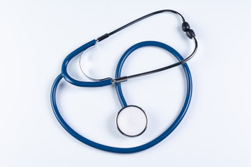 Blue stethoscope in the desk