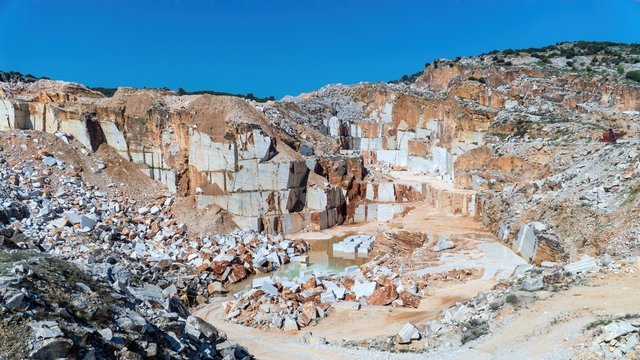 Marble quarry pit full of rocks and blocks in Marmara island, Turkey