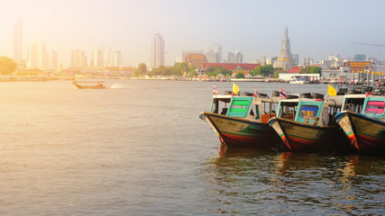 Fototapeta premium Colorful Passenger Boats at Chao Phraya River, bangkok thailand.