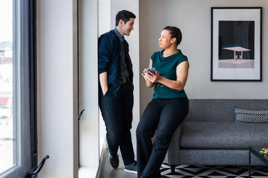 Business colleagues posing in office
