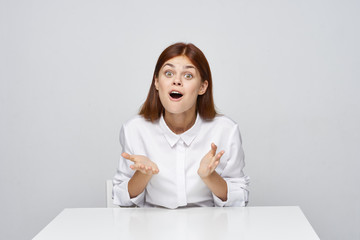 woman sitting at desk with laptop