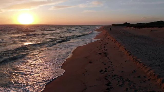 Aerial 4k Footage of Sunset at Miacomet beach, Nantucket, famous tourist attraction and Landmark of Nantucket Island.