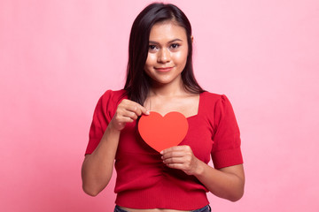 Asian woman with red heart.