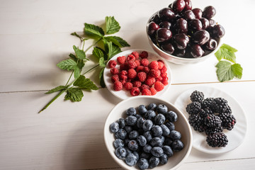 mixture variety of fresh ripe organic superfood antioxidant anfti aging food summer berries 