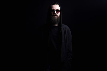 Man in Hood and sunglasses. Boy in a hoodie