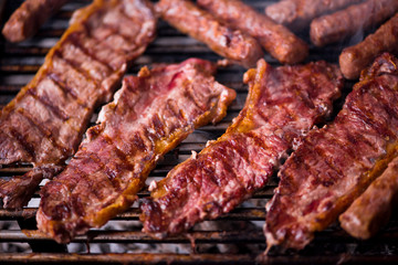 delicious grilled meat on barbecue