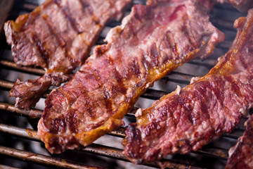 delicious grilled meat on barbecue