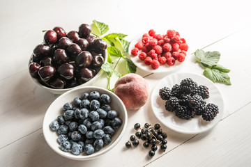 mixture variety of fresh ripe organic superfood antioxidant anfti aging food summer berries 