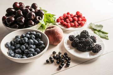 mixture variety of fresh ripe organic superfood antioxidant anfti aging food summer berries 
