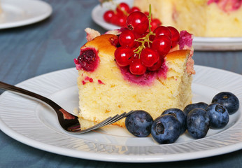 Berry cake bars with raspberries and  red currant and blueberries