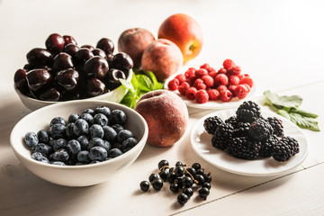 mixture variety of fresh ripe organic superfood antioxidant anfti aging food summer berries 