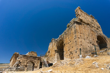 Hierapolis Ancent City ruins in Pamukkale, Denizli, Turkey. Roman theater exterior view.