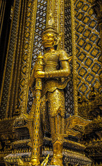 Beautiful close up color black white and gold Wat Phra Kaew or Temple of Emerald Buddha, Guardian statues pagoda and Grand palace located within the grounds of the Grand Palace in Bangkok