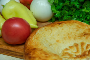 Traditional bread tortillas, pita bread, in eastern countries with vegetables