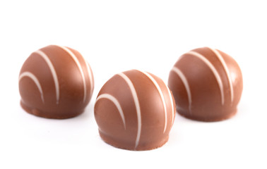 Milk Chocolate Truffles Filled with Vanilla on a White Backgroun