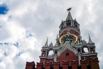 Moscow. Russia. The Red Square. Kremlin. Spasskaya Tower. Russian Federation. Travel to Russia. Hours on Red Square. Chimes on the Spassky Tower. Center of Russia. Kremlin walls.