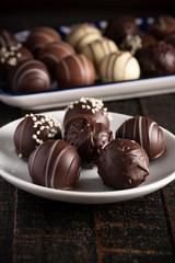 Chocolate Truffles on a Rustic Wooden Table