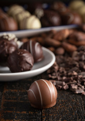 Chocolate Truffles on a Rustic Wooden Table