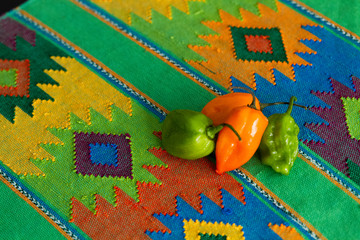Four Habanero Chile Peppers on Table