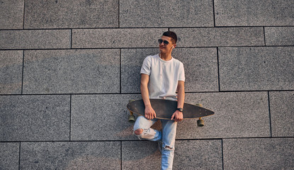 Young guy with longboard