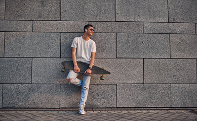 Young guy with longboard