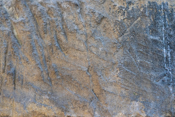 Textura de roca áspera gris y marrón