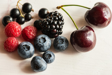 close up variety of summer fresh ripe super fruits 