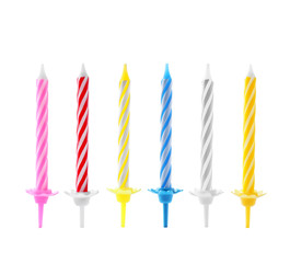 Set with different birthday candles on white background