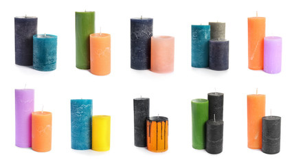 Five color wax candles on white background