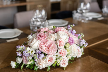 Wedding Banquet or gala dinner. The chairs and table for guests, served with cutlery and crockery.