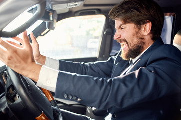 young man in a car