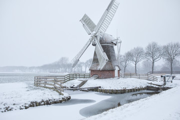 Dutch windmill in snow