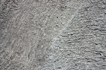 Texture, roughness of hardened cement mortar. View from above on a sunny day.