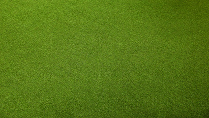 an artificial green grass in perspective view, wide shot