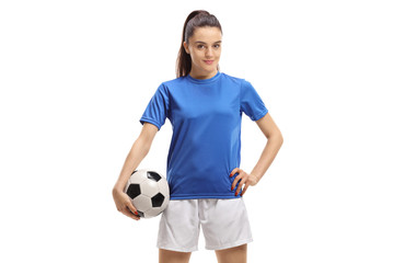 Female soccer player posing with a football © Ljupco Smokovski
