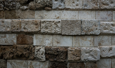 Background of old stone. Limestone is a sedimentary, detrital rock of organic, less often chemogenic origin, consisting of calcium carbonate (CaCO3) in the form of calcite crystals.