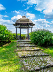 A beautiful gazebo in the background of blue sky