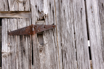old wooden door with hinge