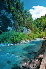 Fototapeta premium Blue river in the mountains of Abkhazia